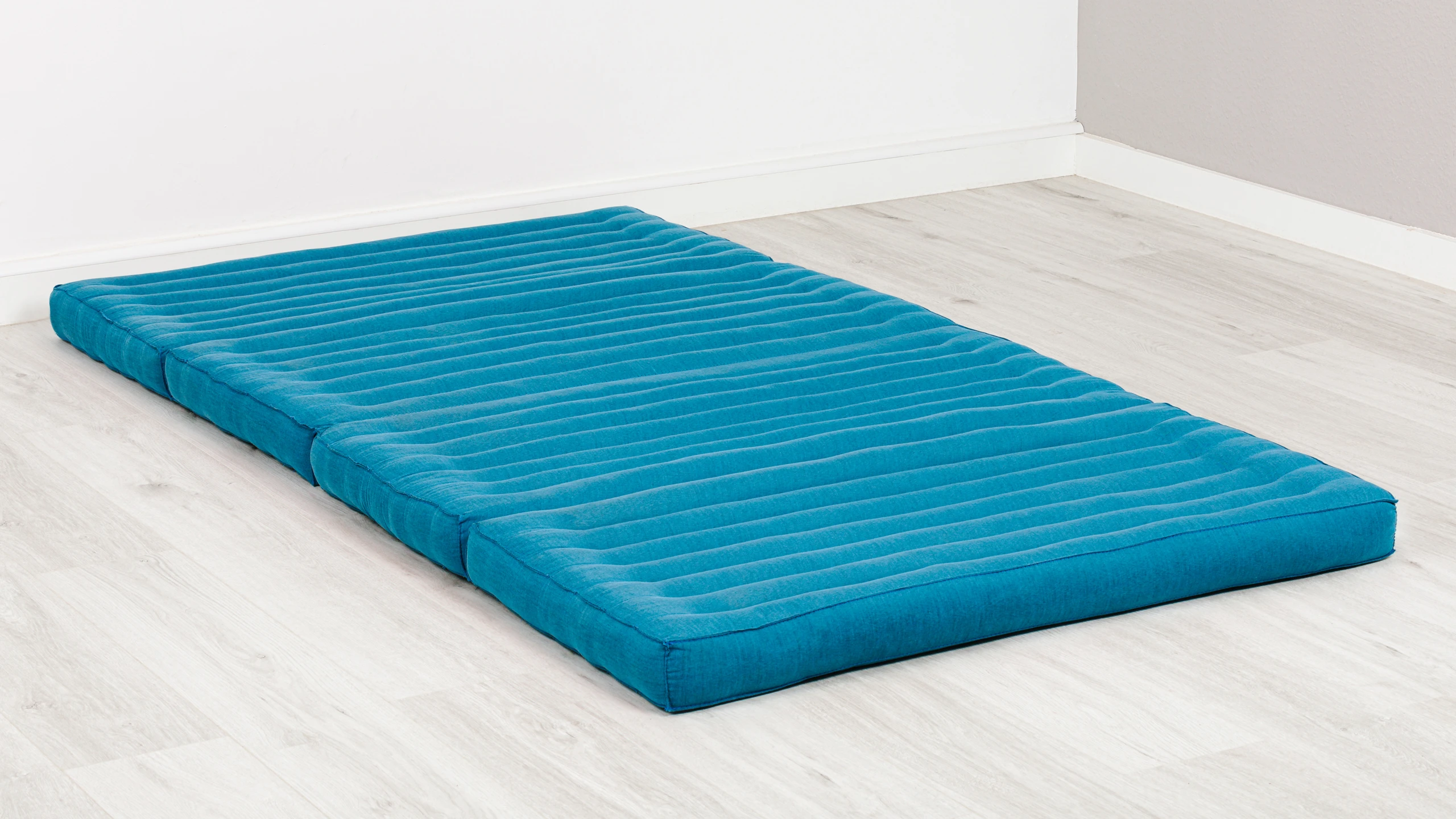 Klappmatratze-110_a3-hellblau-einfarbig_1039058803_1_frei Matelas pliable en kapok, 110 cm de large, Basic